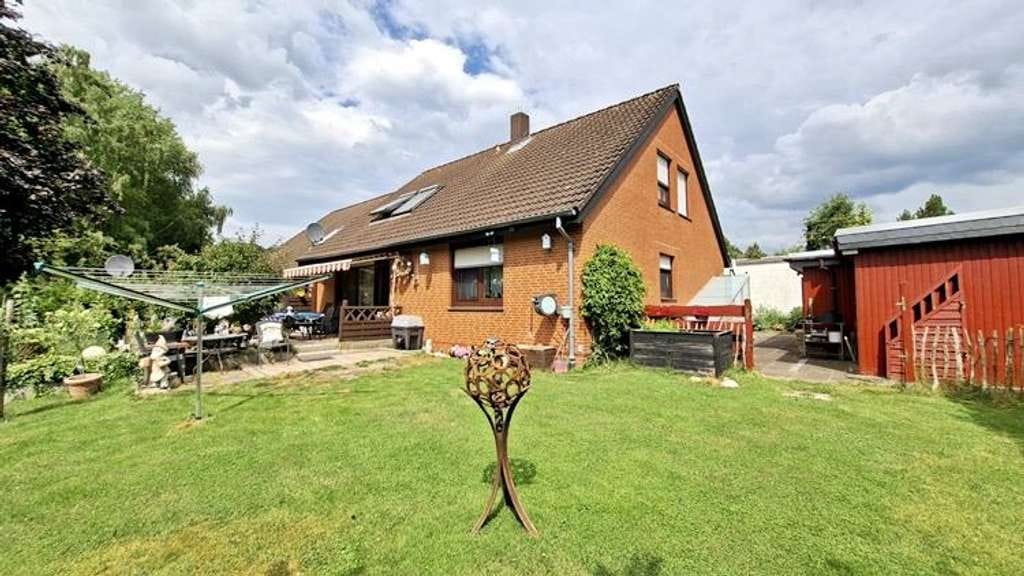 Immobilie in Hambergen - immo-schramm.de: ANLAGE: Gepflegte Doppelhaushälfte mit 2 Wohnungen - Bild 1