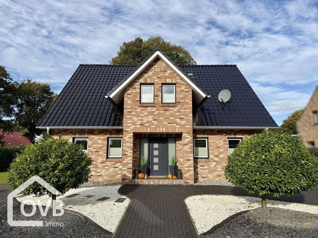 Immobilie in Holtland - Junges, top modernes Einfamilienhaus mit Garage und großzügigem Grundstück - Bild 1