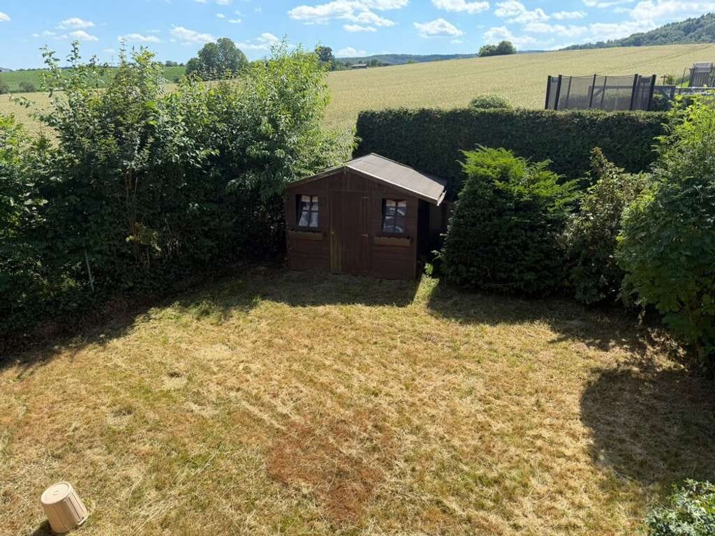 Immobilie in Wörth am Main - Klasse Lage ... Gemütliche Doppelhaushälfte mit Terrasse und Garten! - Bild 2