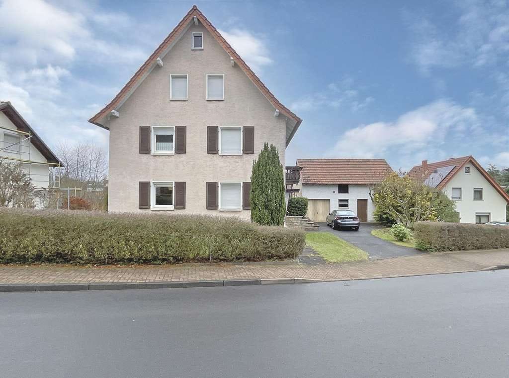 Immobilie in Eichenzell - Solide Kapitalanlage: Zweifamilienhaus in Eichenzell Rothemann mit viel Grünfläche - Bild 4