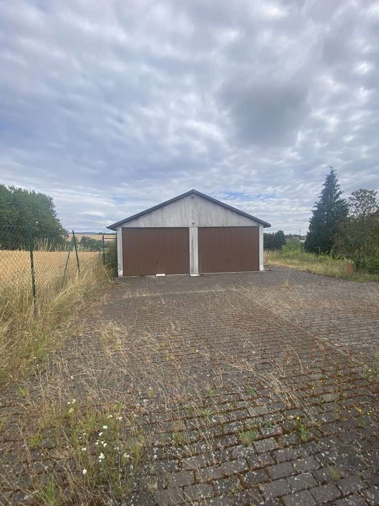 Immobilie in Konken - Dreifamilienhaus mit drei Garagen in ruhiger Seitenstraße - Bild 3