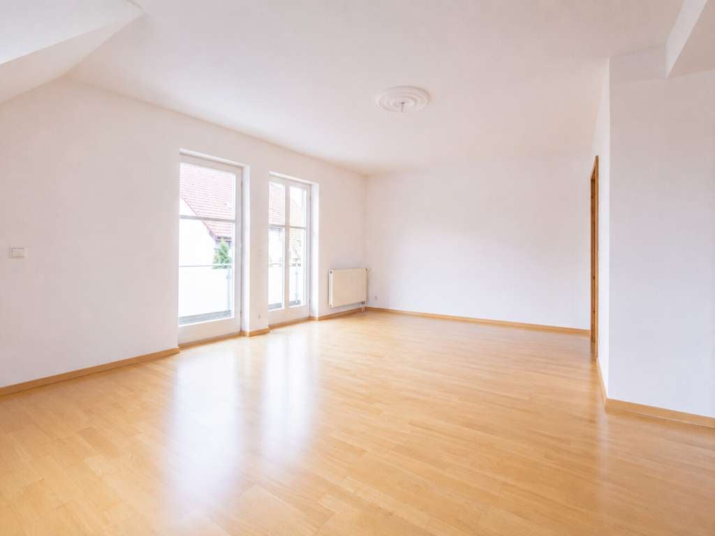 Immobilie in Schallstadt - BRUMANI | Helle & große 2 Zimmer Maisonette-Wohnung mit Nord-Balkon und Stellplatz in Schallstadt - Bild 2