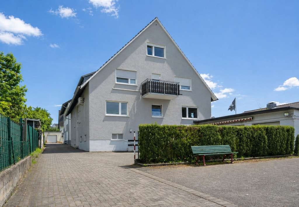 Immobilie in Lohmar - Attraktives Renditeobjekt in Lohmar – Vollvermietetes Mehrfamilienhaus in gefragter Wohnlage - Bild 0