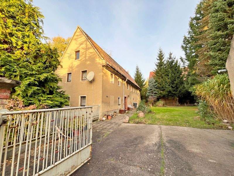 Immobilie in Oschatz - Idyllisches Grundstück mit eigenem Quellteich, Baumbestand und stark sanierungsbedürftigem Wohnhaus sowie großer Sche... - Bild 1