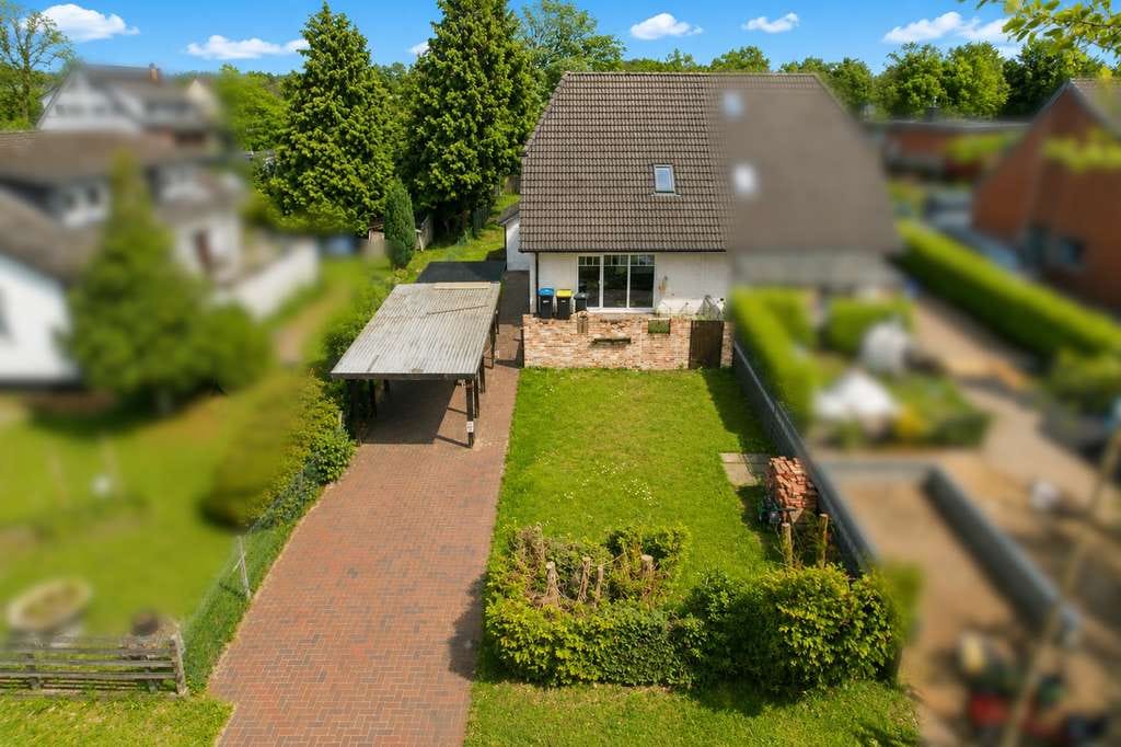 Immobilie in Gyhum - Familienfreundliche Doppelhaushälfte mit großem Garten in ruhiger Wohnlage - Bild 0