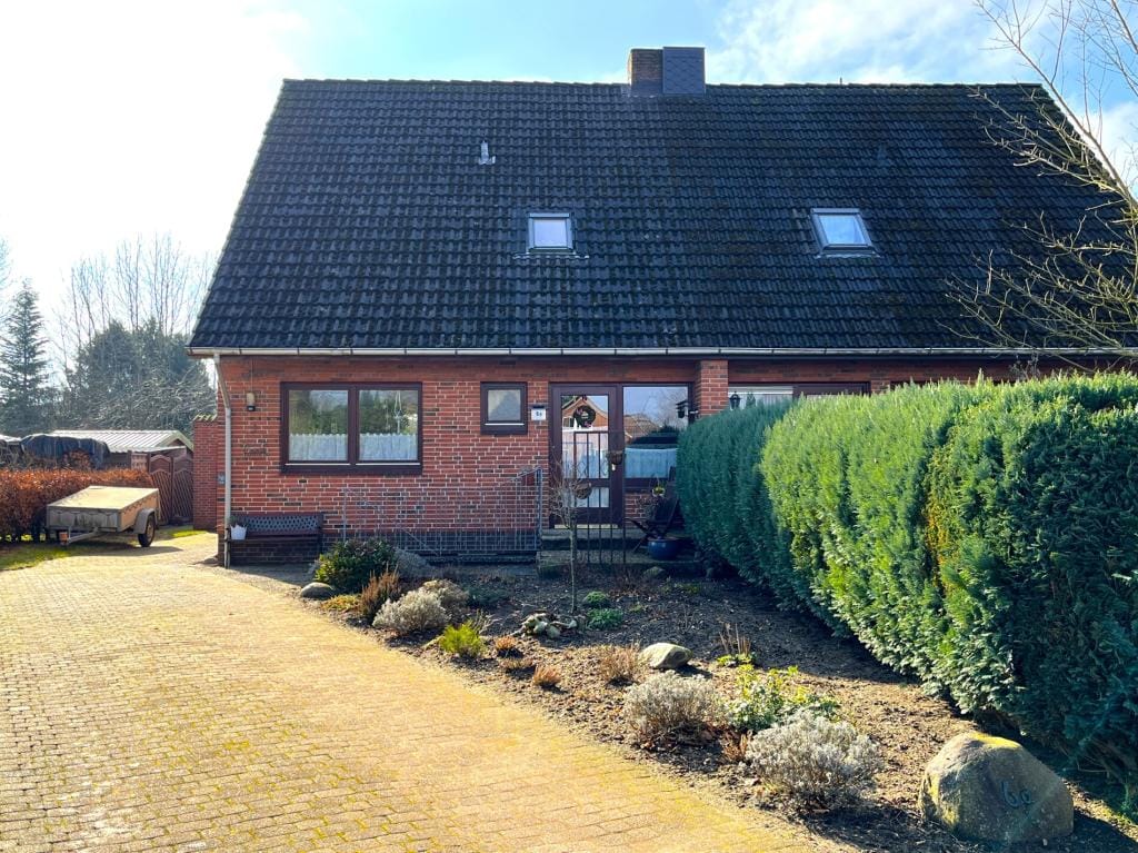 Immobilie in Drage - Familienfreundliches Zuhause mit Garage in idyllischer Dorflage - Bild 2