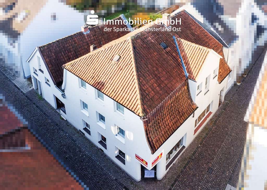 Immobilie in Warendorf - Wohn- und Geschäftshaus für Kapitalanleger - Zwei Wohneinheiten + ein Ladenlokal! - Bild 1