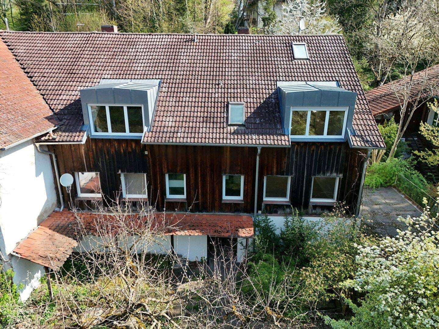 Immobilie in Neufahrn bei Freising - Aufgeteiltes Mehrfamilienhaus in ruhiger Lage mit Entwicklungspotenzial - Bild 1