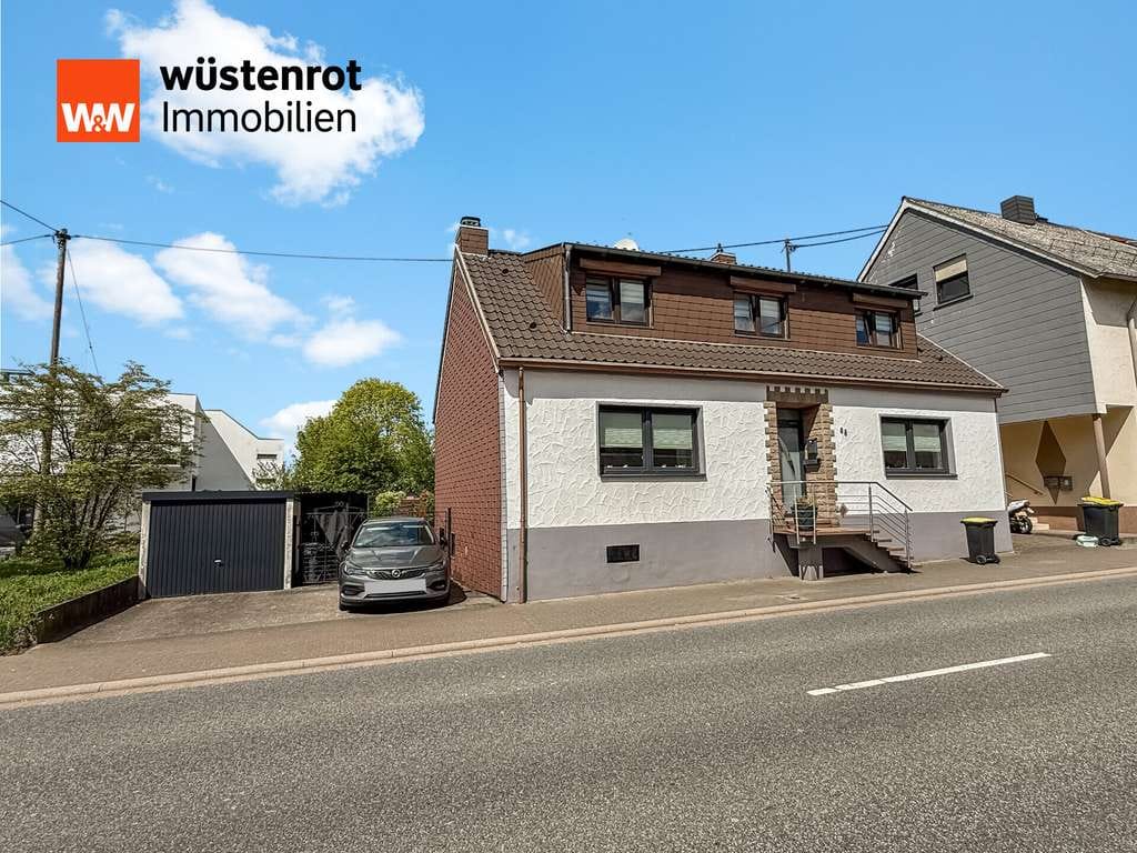 Immobilie in Merchweiler - Einziehen statt renovieren – Einfamilienhaus mit Wintergarten, 2 Bädern und Garage - Bild 0
