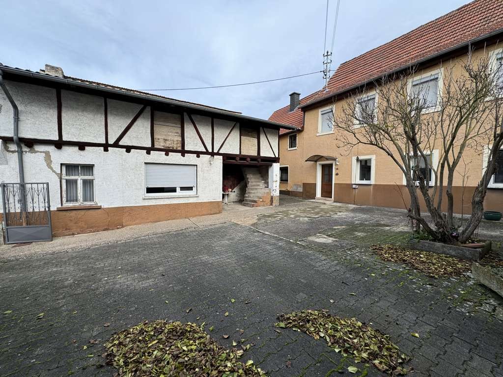 Immobilie in Hüffelsheim - Preiswertes 6-Raum-Mehrfamilienhaus in Hüffelsheim - Bild 1