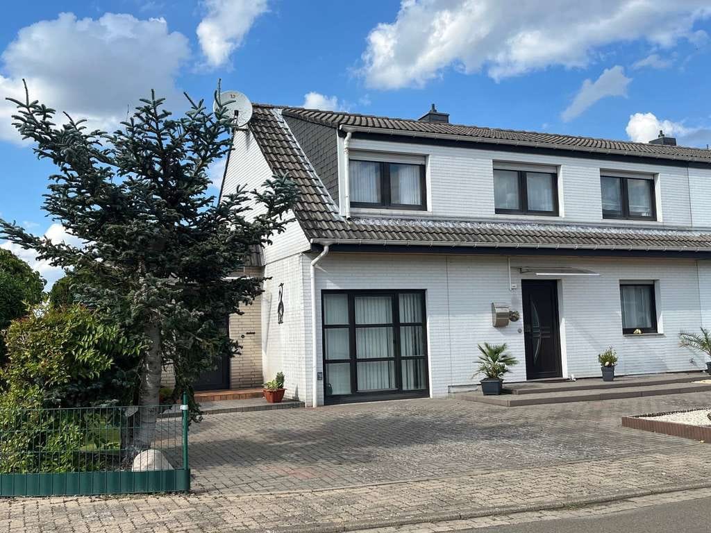 Immobilie in Meerbeck - Attraktive Doppelhaushälfte mit Einliegerwohnung - Bild 1