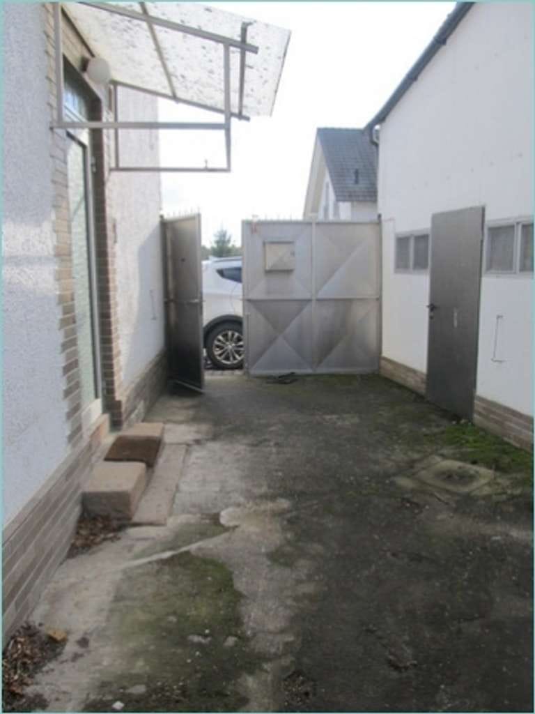 Immobilie in Flörsheim-Dalsheim - Charmantes Einfamilienhaus mit Werkstatt, Scheune und großzügiger Dachterrasse auf 125 m² Wohnfläche - Bild 1