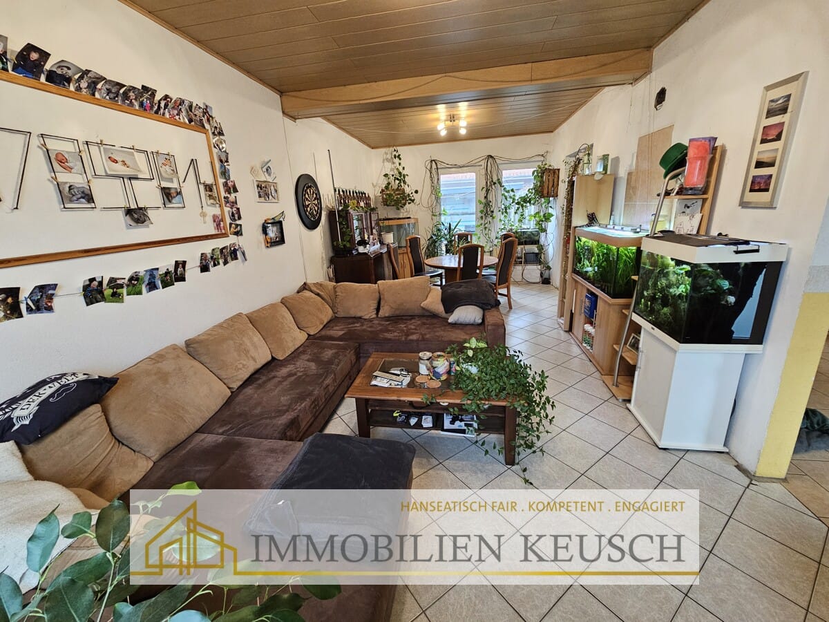 Immobilie in Twistringen - Energieeffiziente DHH mit PV, neuer Wärmepumpe und wasserführendem Kamin in Bestlage - Bild 2