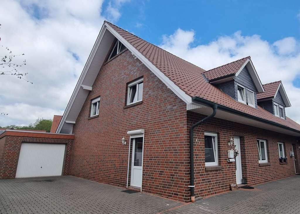 Immobilie in Löningen - Moderne Doppelhaushälfte aus dem Jahr 2000 mit Garage und Garten in guter Lage (ca. 5 % Rendite) - Bild 0