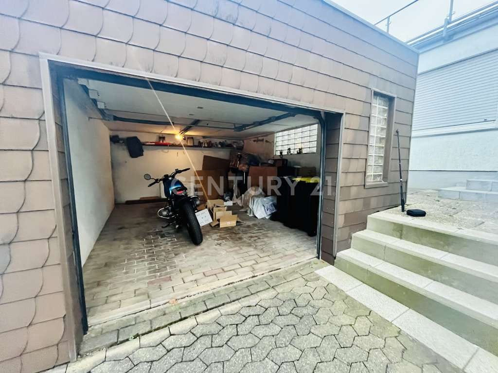 Immobilie in Heusweiler - Familienfreundliches Einfamilienhaus mit großzügigem Garten und viel Raum für Lebensqualität - Bild 2