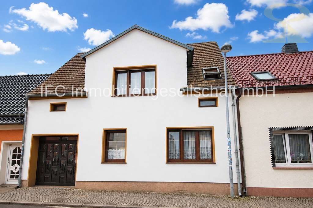 Immobilie in Coswig (Anhalt) - einzugsbereites Reihenmittelhaus mit Nebengelass, Partyraum und überdachter Terrasse in Coswig (Anha - Bild 1