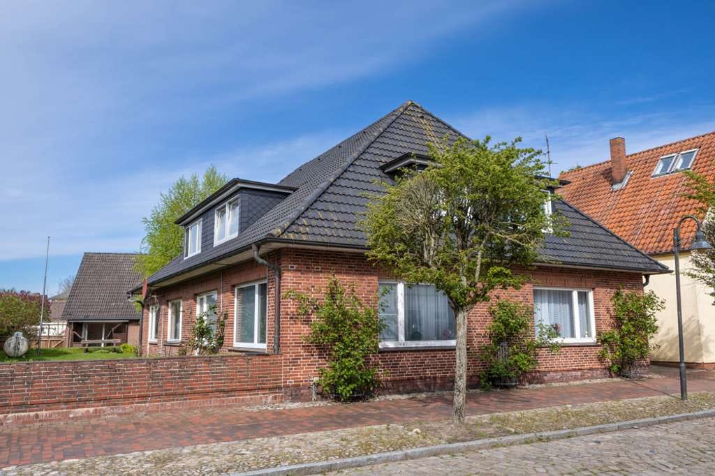 Immobilie in Groven - Solides Mehrfamilienhaus mit vier vermieteten Wohneinheiten in Lunden - Bild 0