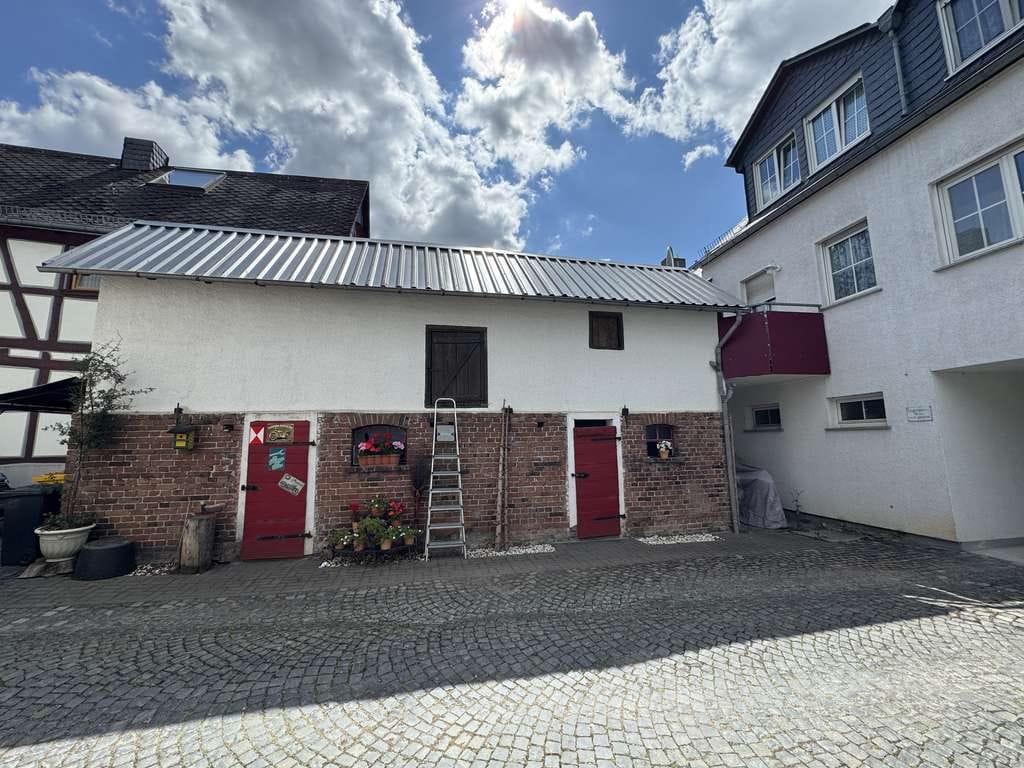 Immobilie in Nastätten - Charmante Maisonettewohnung (60 m²) mit Studio und Balkon mit Blick ins Grüne - Bild 0