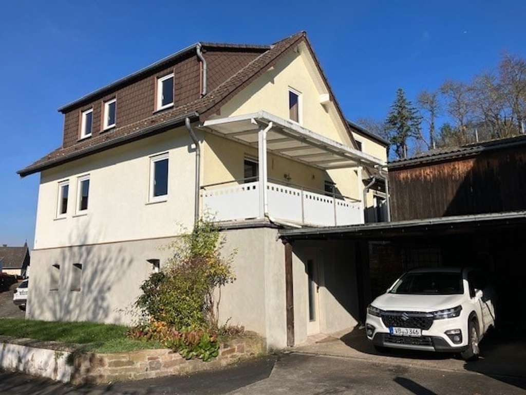 Immobilie in Bad Salzschlirf - Bezahlbares Eigentum in Bad Salzschlirf - Gemütliches Wohnhaus mit Garage und Carport  - Bild 1