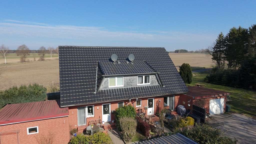 Immobilie in Heidenau - Gepflegtes Doppelhaus in ruhiger Feldrandlage in Heidenau - Bild 0
