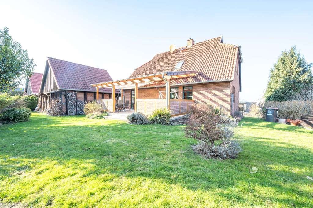 Immobilie in Nienstädt - Familientraum in ruhiger Lage – Gepflegtes Einfamilienhaus mit Kamin, großem Garten und Doppelgarage - Bild 0