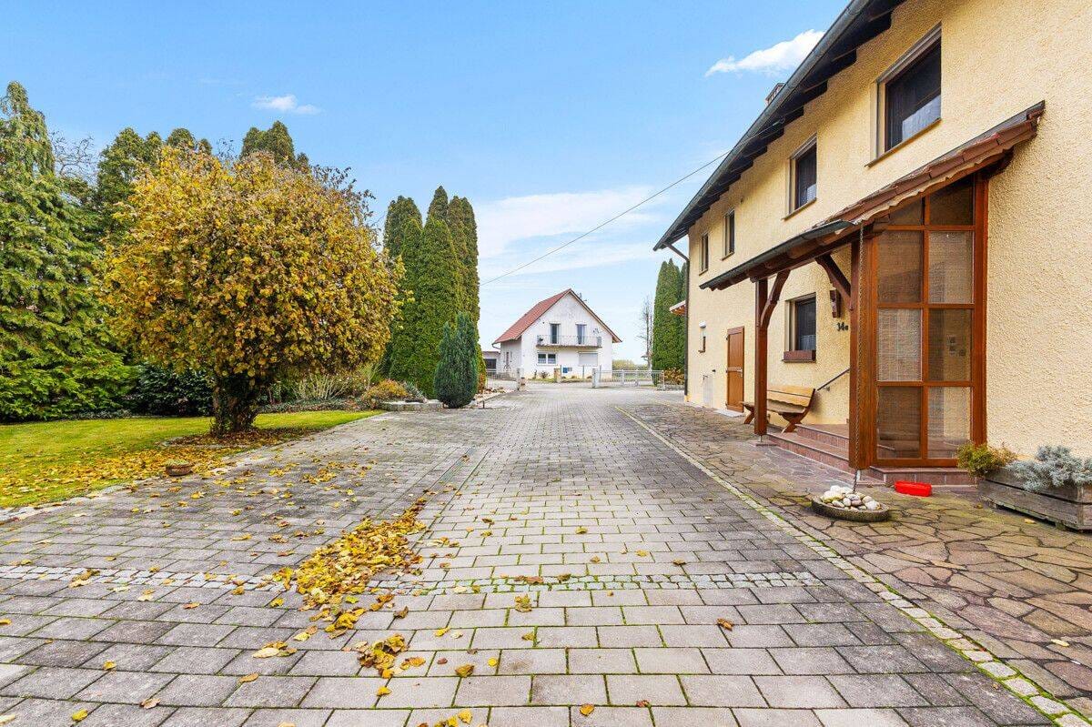 Immobilie in Oberschneiding - Willkommen Zuhause! Großzügiges Einfamilienhaus mit Wintergarten und herrlichem Grundstück! - Bild 4