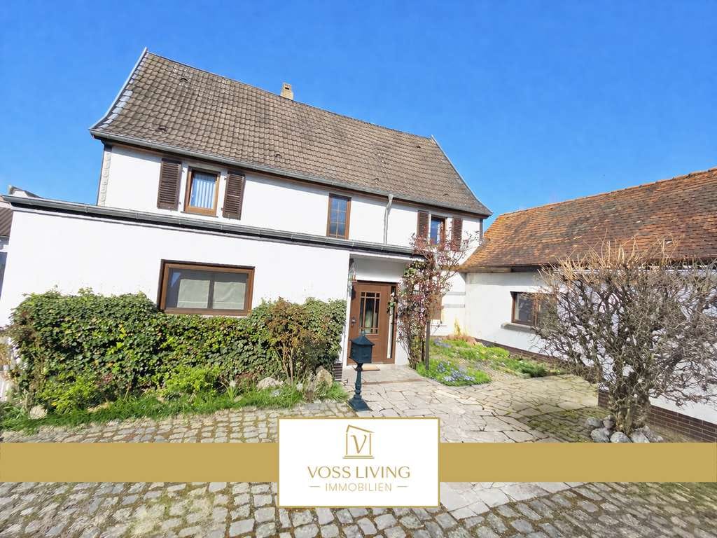 Immobilie in Wöllstadt - Charmantes Einfamilienhaus mit Nebengebäude Garten, Garage und schönem Innenhof in ruhiger Lage - Bild 0