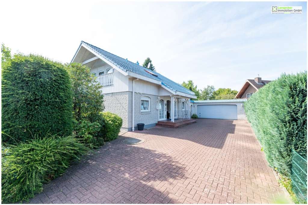 Immobilie in Kiebitzreihe - Kiebitzreihe: Das besondere Einfamilienhaus mit Doppelgarage und viel Platz in toller Lage - Bild 1