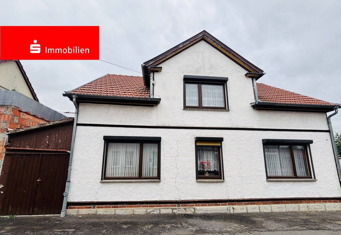 Immobilie in Hörselberg-Hainich - ***Da lässt sich was draus machen! - Einfamilienhaus mit Nebengelass und Garagen in Tüngeda*** - Bild 1