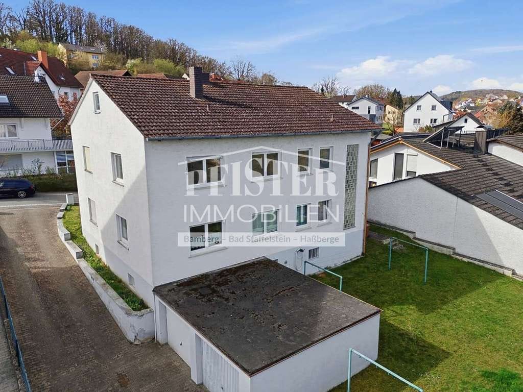 Immobilie in Viereth-Trunstadt - Attraktives, sanierungsbedürftiges Zweifamilienhaus in Viereth mit großem Garten/ teilvermietet - Bild 0