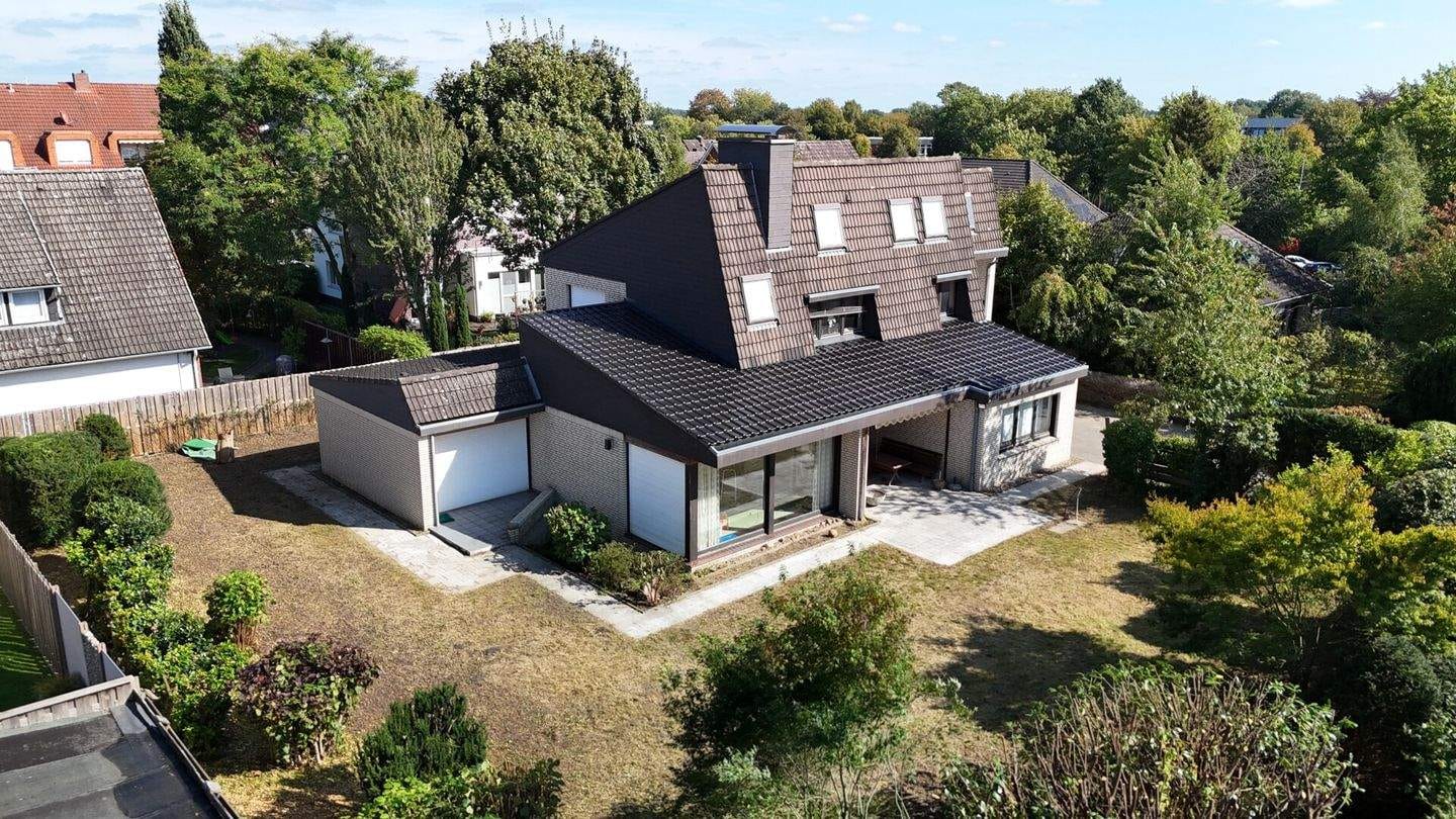 Immobilie in Wildeshausen - Schulviertel: EFH über 4 Ebenen auf knapp 206 m² Wohnfläche, ausgeb. DB mit Garage - Bild 1