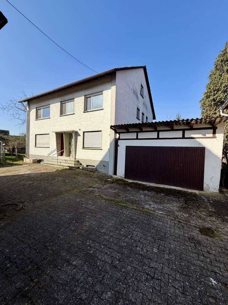 Immobilie in Willstätt - 7-Zimmer-Haus am Schutter-Ufer: 1.468 m² Grundstück & viel Potenzial - Bild 0