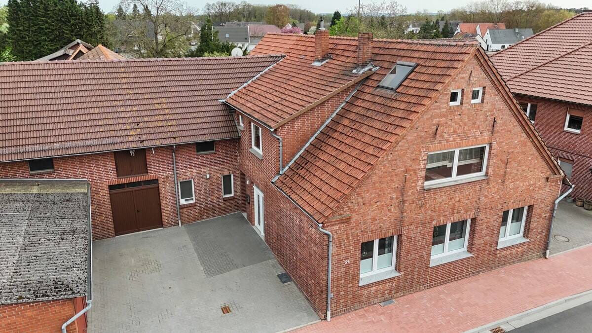 Immobilie in Diepenau - Zweifamilienhaus mit vielseitig nutzbaren Nebengebäuden in 31603 Diepenau - Bild 1