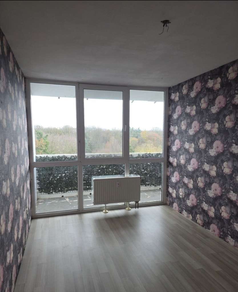 Immobilie in Dormagen - Stilvolle 4-Zimmer-Wohnung mit zwei Balkonen und Blick ins Grüne kernsaniert - Bild 1