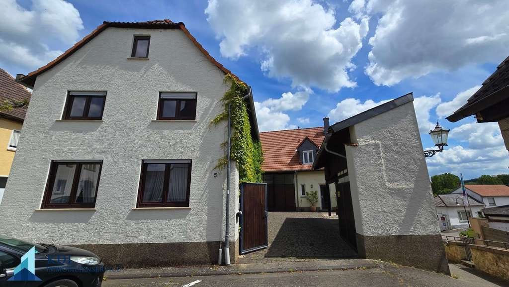 Immobilie in Stadecken-Elsheim - Ein Objekt - zwei Häuser: Modernes Zuhause trifft Altbau mit Zukunftspotenzial - Bild 0