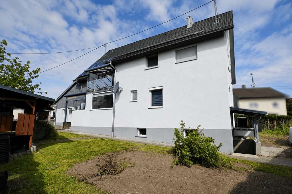 Immobilie in Kanzach - Wohnqualität für Familien: Modernisiertes Zweifamilienhaus mit Ausbaureserve - Bild 3