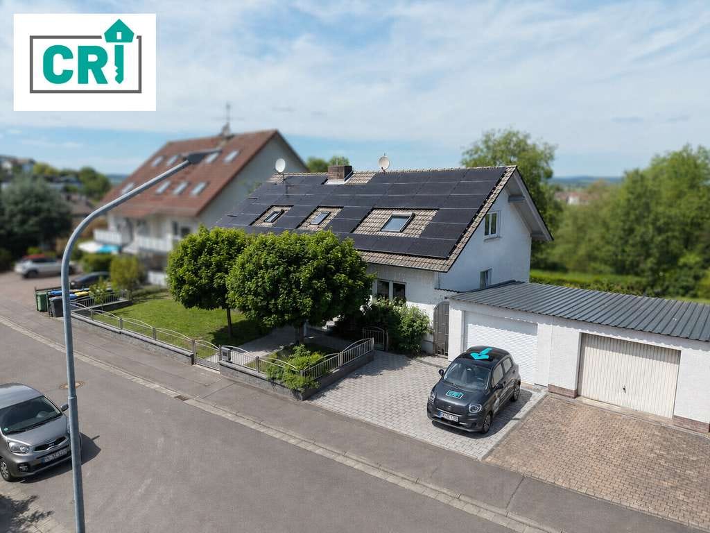 Immobilie in Weimar (Lahn) - Wohnen mit Urlaubsfeeling – großzügiges Zuhause mit Einliegerwohnung und Schwimmteich - Bild 0