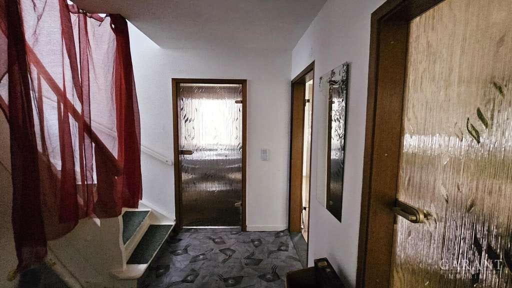 Immobilie in Steinheim am Albuch - Einfamilienhaus mit Wintergarten und viel Potential - Bild 3
