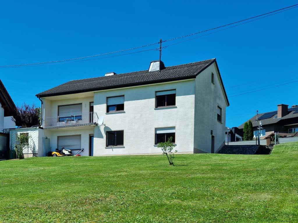 Immobilie in Seck - Familienfreundliches Haus mit großem Grundstück, Einliegerwohnung und herrlichem Ausblick - Bild 1