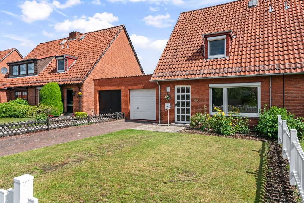 Immobilie in Ritterhude - Charmante Doppelhaushälfte mit großem Garten und viel Gestaltungspotenzial in ruhiger Lage - Bild 1