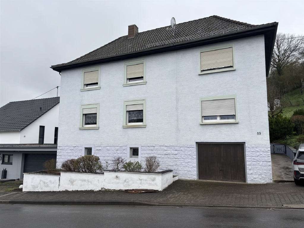 Immobilie in Glan-Münchweiler - Glan-Münchweiler - Zweifamilienhaus mit Garage und Garten - Bild 0