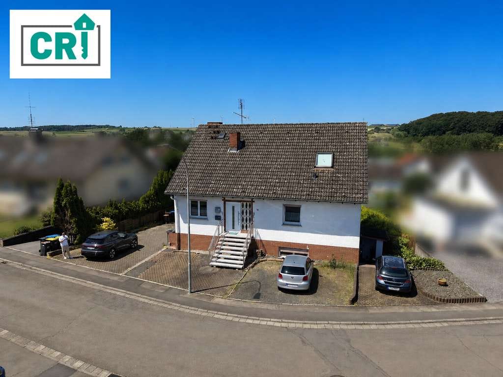 Immobilie in Gemünden (Felda) - Kapitalanlage mit drei Wohneinheiten auf großzügigem Grundstück - Bild 0