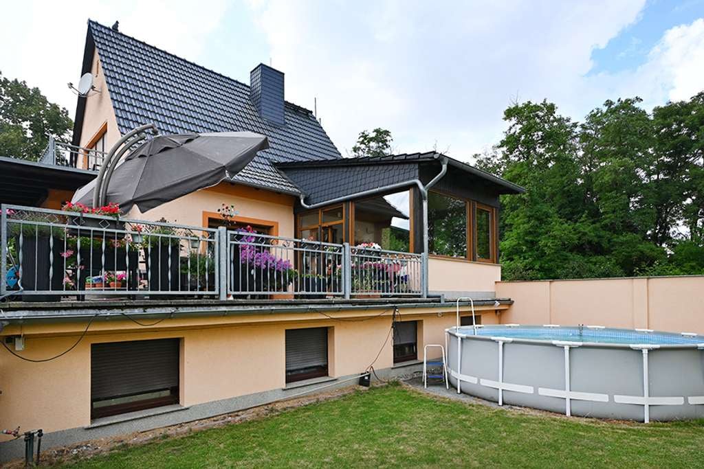 Immobilie in Börde-Hakel - Familienfreundliches Einfamilienhaus mit Wintergarten und großem Garten! - Bild 0