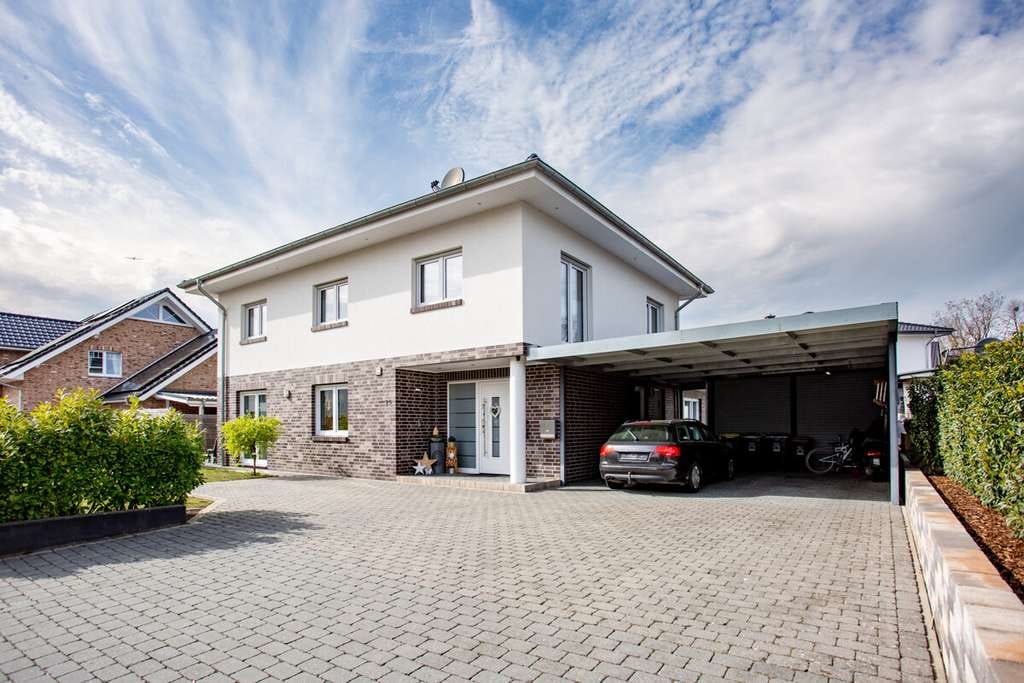 Immobilie in Bohmte - Exklusives Einfamilienhaus mit Einliegerwohnung in familienfreundlicher Lage von Bohmte! - Bild 0