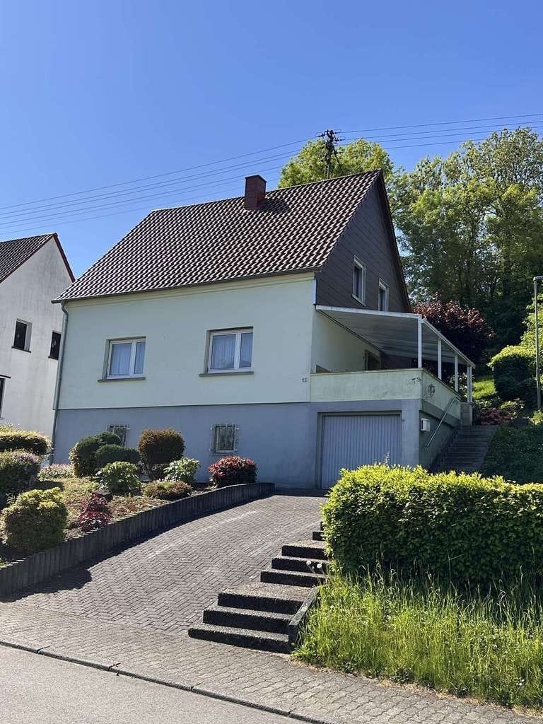 Immobilie in Merchweiler - Gemütliches Einfamilienhaus mit Garten in Wemmetsweiler - Bild 1