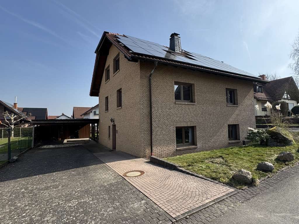 Immobilie in Amöneburg - Wohnen mit Zukunft: Wärmepumpe, Photovoltaik und 230 m² Lebensqualität! - Bild 0