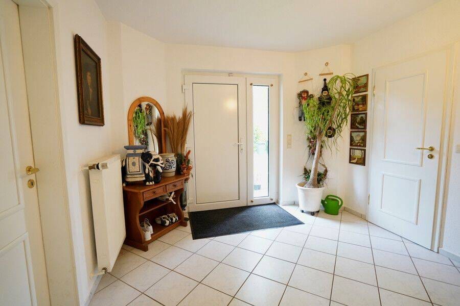 Immobilie in Hepstedt - Gemütliches Einfamilienhaus mit Kamin, Terrasse und viel Potenzial in ruhiger Lage - Bild 1