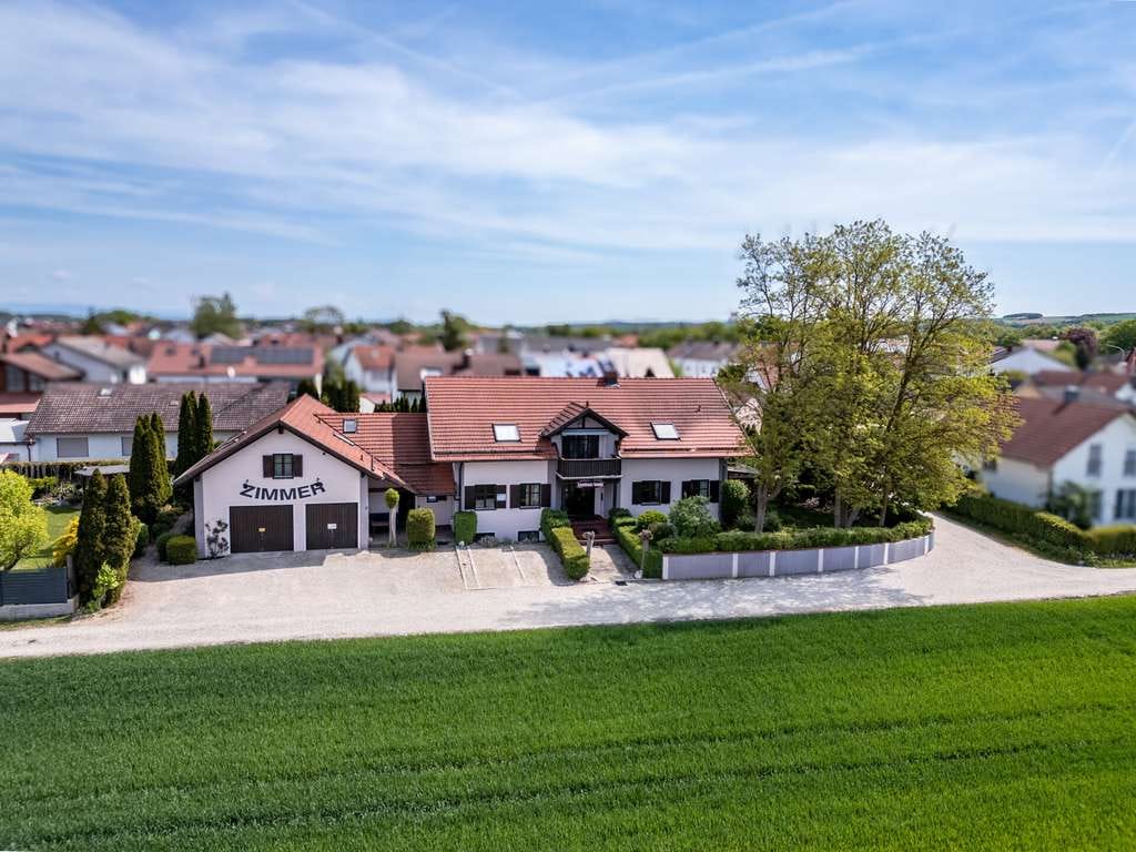 Immobilie in Gottfrieding - Charmantes Mehrfamilienhaus im mediterranen Stil – vielseitig nutzbar mit hohem Renditepotenzial - Bild 2