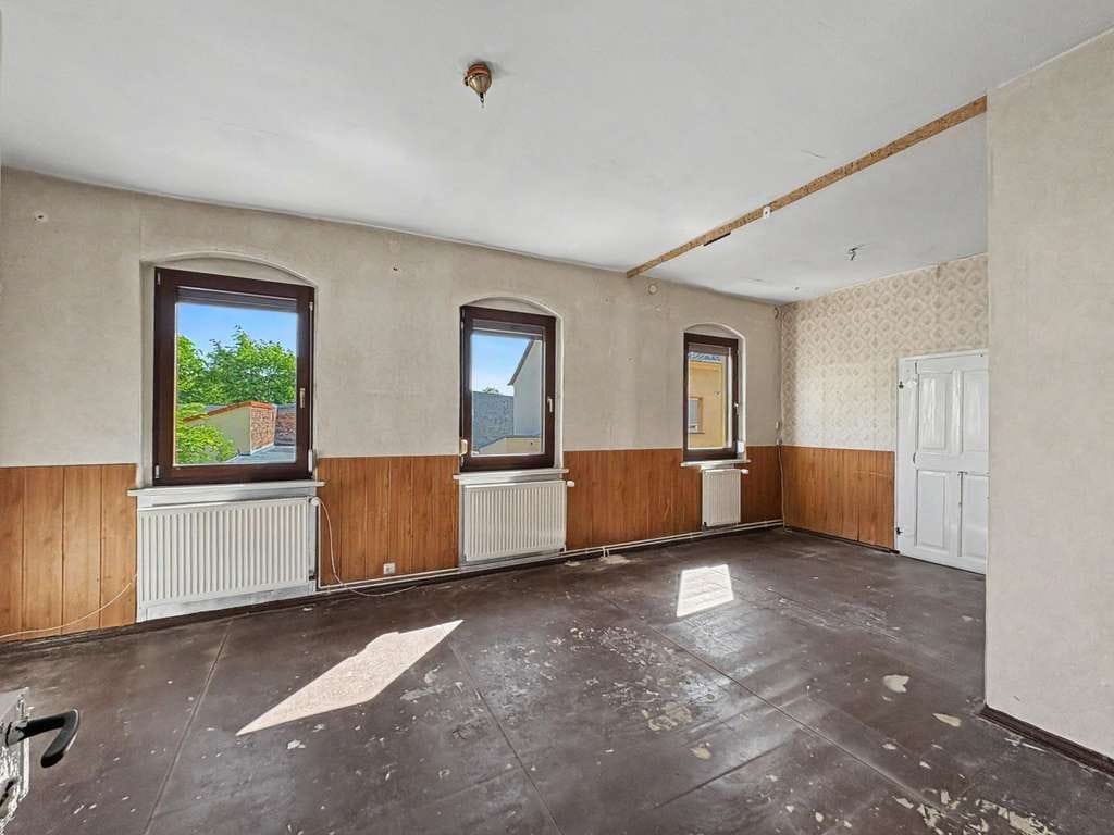Immobilie in Eilenburg - Zentral gelegenes Reihenmittelhaus mit Entwicklungspotenzial und Innenhof in Eilenburg - Bild 4