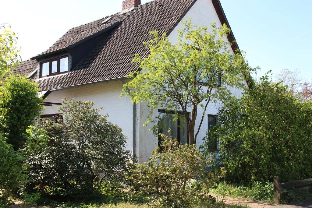 Immobilie in Tostedt - Grosses Einfamilienhaus mit Garage, riesigem Garten und SUPER RENDITE - Bild 1